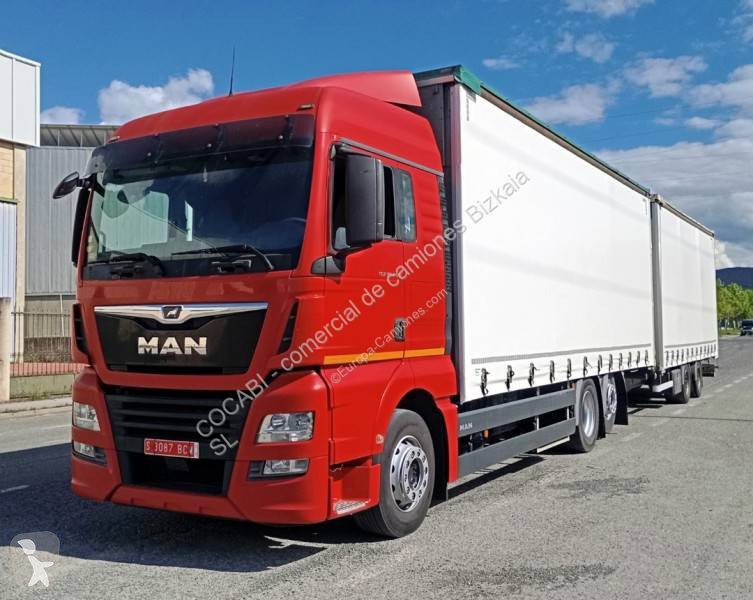 Camión Remolque MAN TGX 26.460 Tautliner 6x2 Euro 6 de Ocasión - 622.000 km - miniatura 1